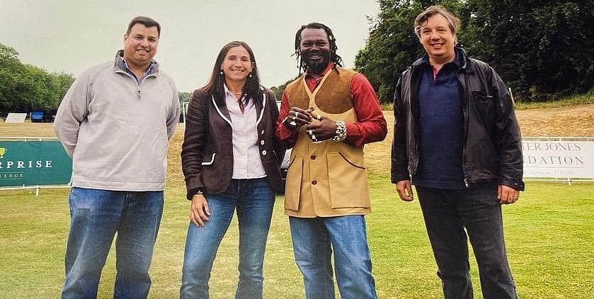 Andrew Subramaniam and Levi Roots posing for a photo in the countryside